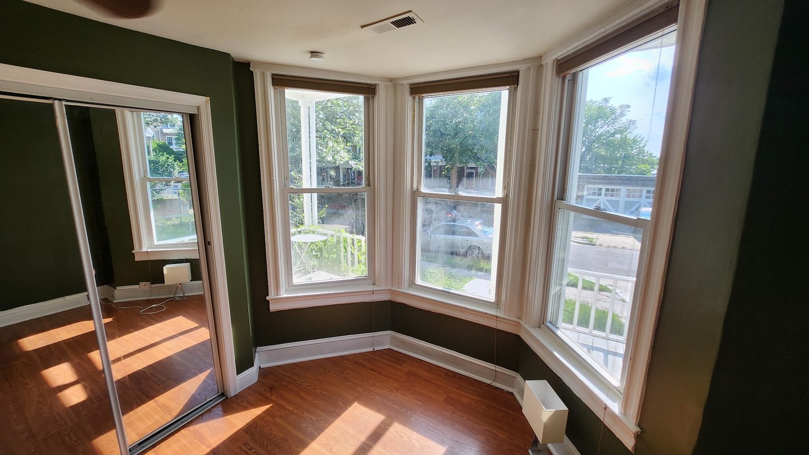 Delta Room's beautiful bay window overlooking the front yard