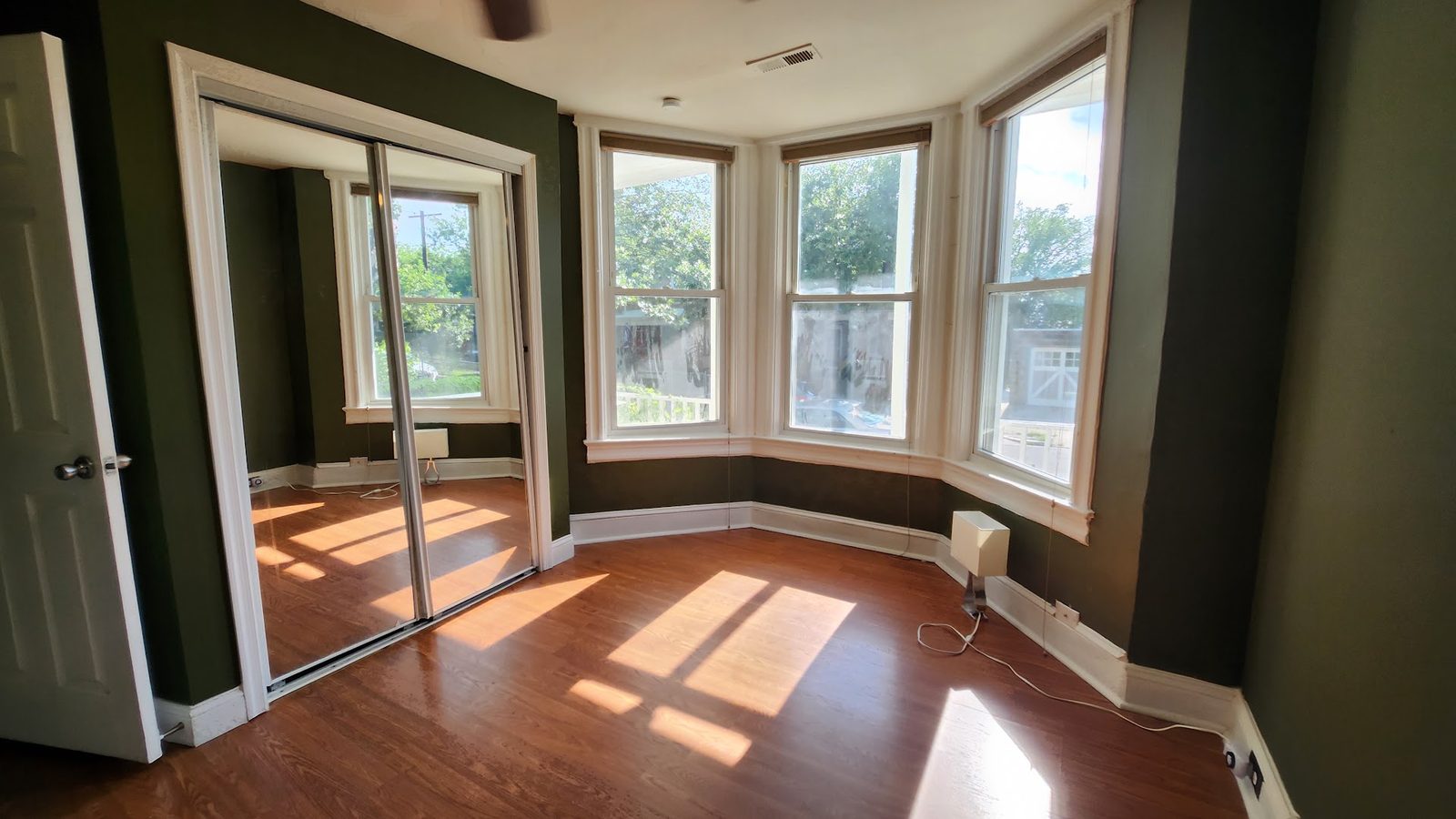 Delta Room furnished with full-size bed and desk