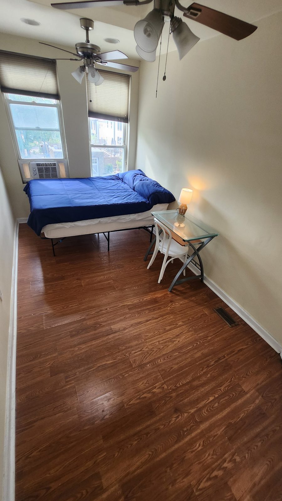 Foxtrot Room furnished with full-size bed and desk