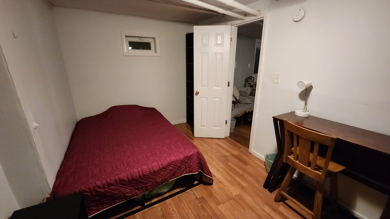Lincoln Room furnished with bed and desk